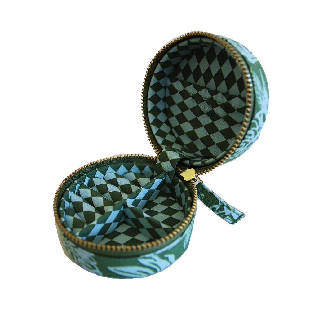 Open green and blue patterned mini linen jewellery case on a white background