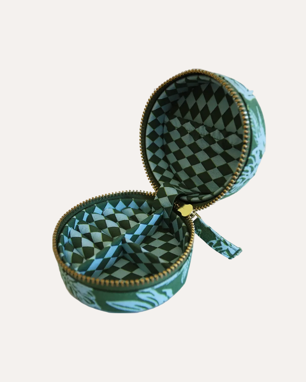 Open green and blue patterned mini linen jewellery case on a white background