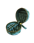 Open green and blue patterned mini linen jewellery case on a white background